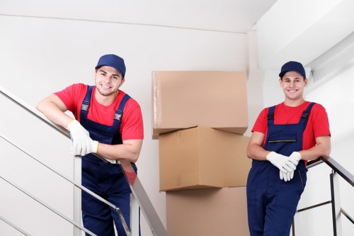 Removal team preparing a same-day move in Wandsworth with packed boxes and furniture