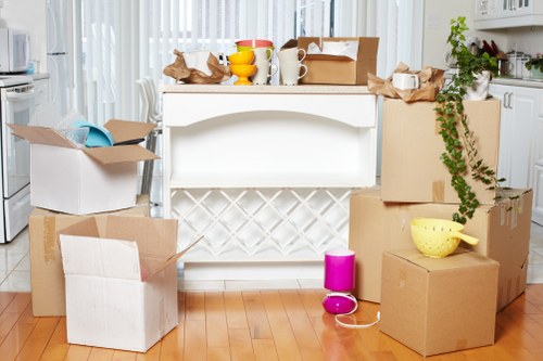 Experienced Wandsworth movers unloading belongings at a new property