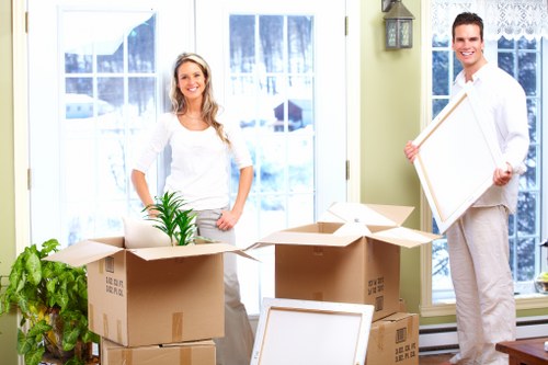 Packed boxes and furniture prepared for storage in a local Wandsworth property