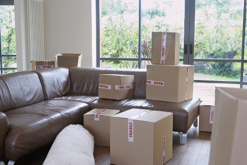 Prepared office workspace boxes and labelled items for relocation